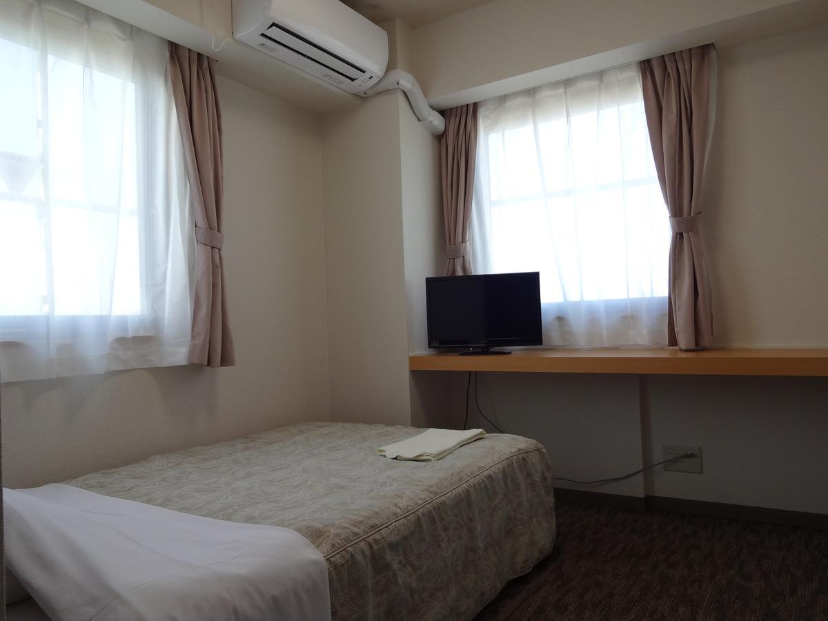 Ushiku City Hotel Ekimaekan Екстер'єр фото